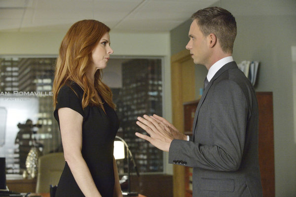 Still of Patrick J. Adams and Sarah Rafferty in Suits (2011)