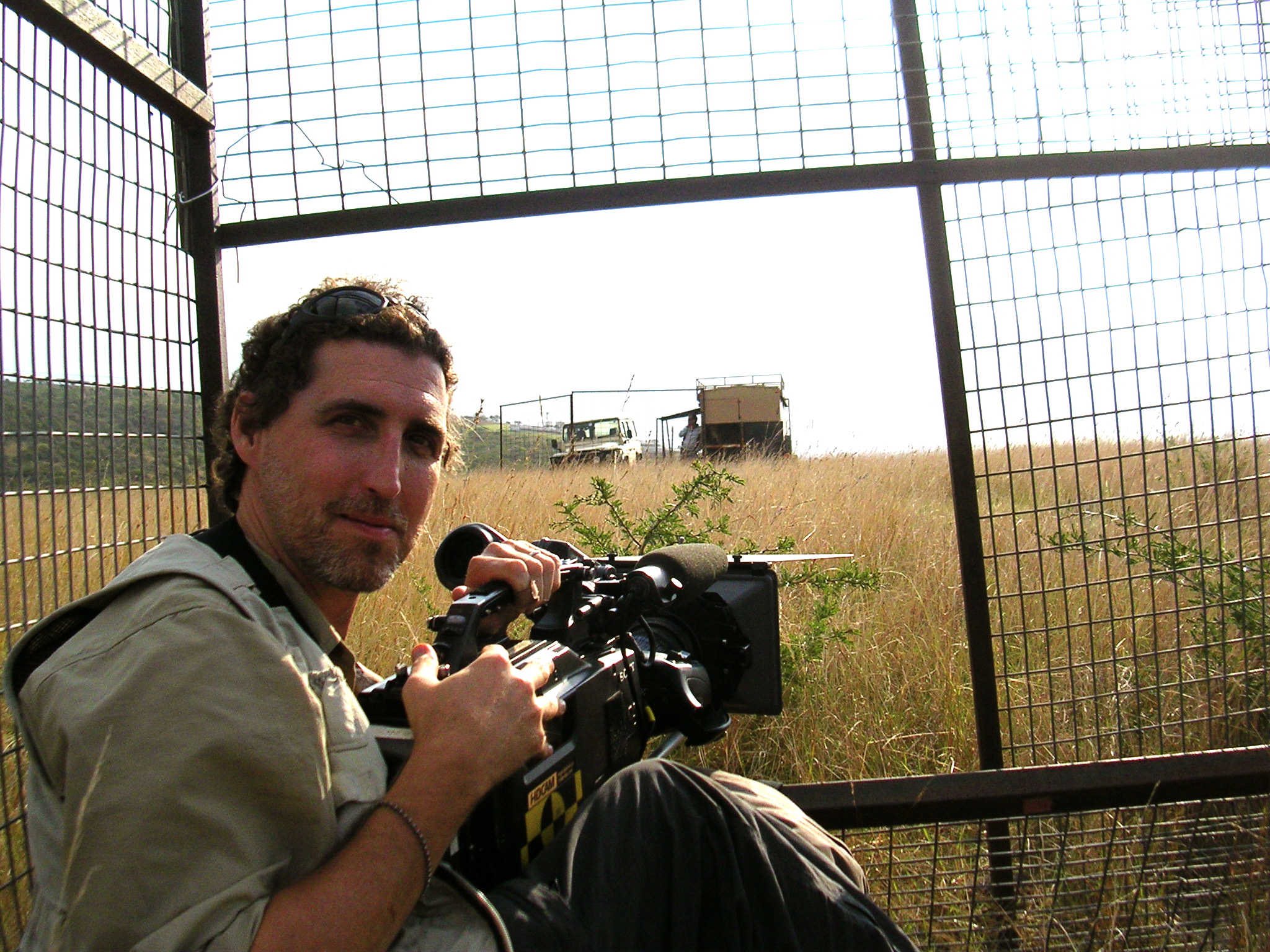 In Africa filming lions.