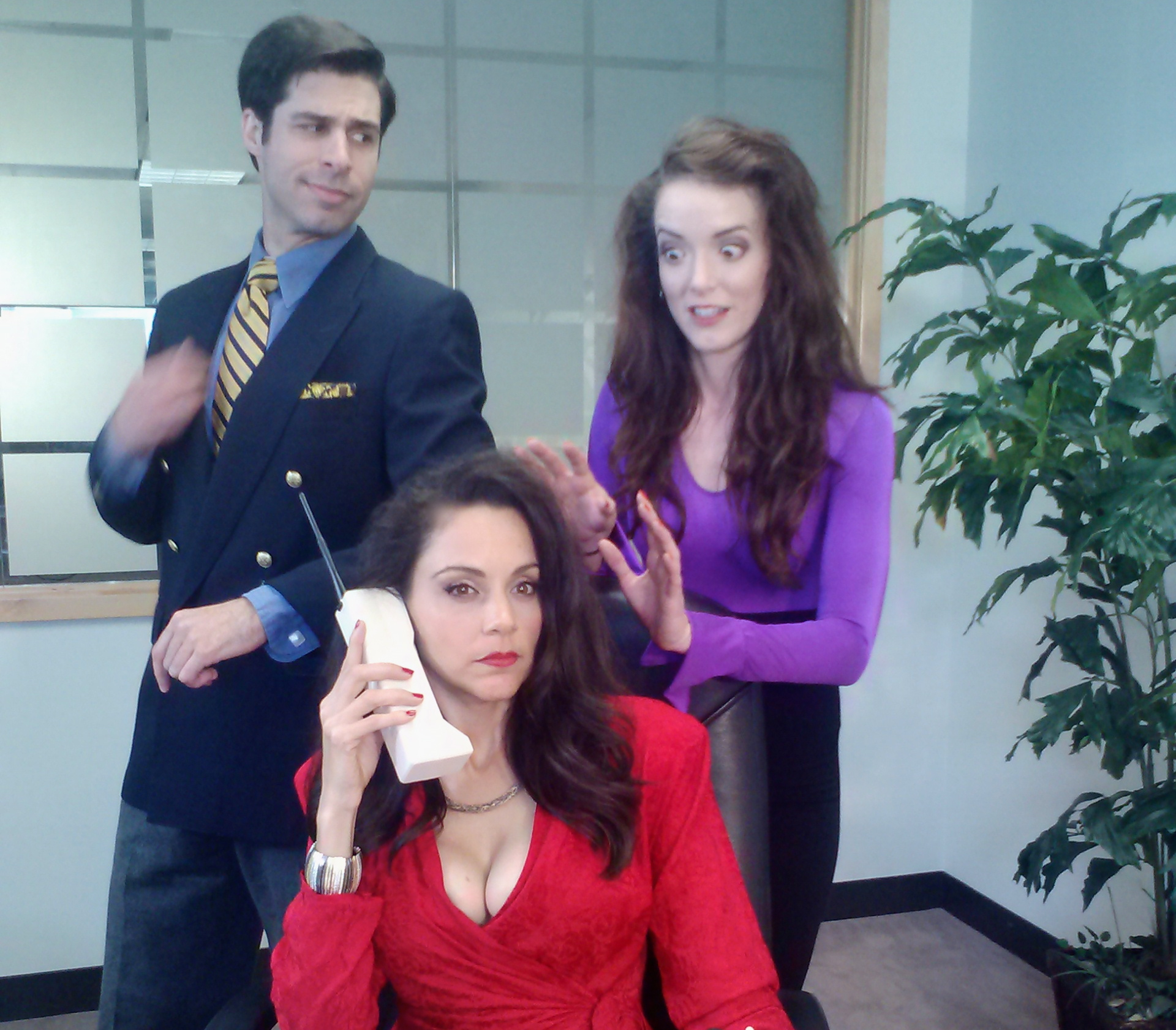 Paul Galliano, Tessa Munro (w/phone) and Laura Denton on the set of the comedy, 