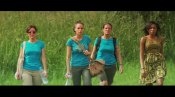 Screen shot of Jenifer Brougham, Tessa Munro, Ilaria Chessa, and Mbong Amata in a village in the Niger Delta region.