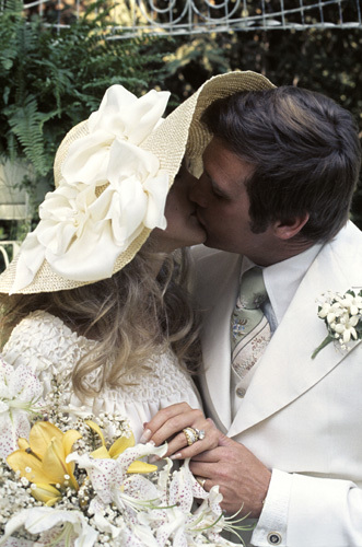 Farrah Fawcett with husband Lee Majors on their wedding day July 28, 1973