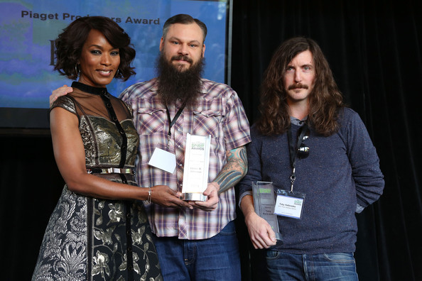 Toby Halbrooks and James M. Johnston accept the Piaget Producers Award from Angela Bassett at the 2014 Film Independent Filmmaker Grant And Spirit Awards Nominees Brunch at BOA Steakhouse on January 11, 2014 in West Hollywood, California.