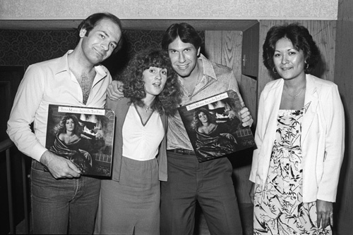 Teena Marie visiting record industry trade magazine offices with Motown Records promotion staff and staff of Record World Magazine