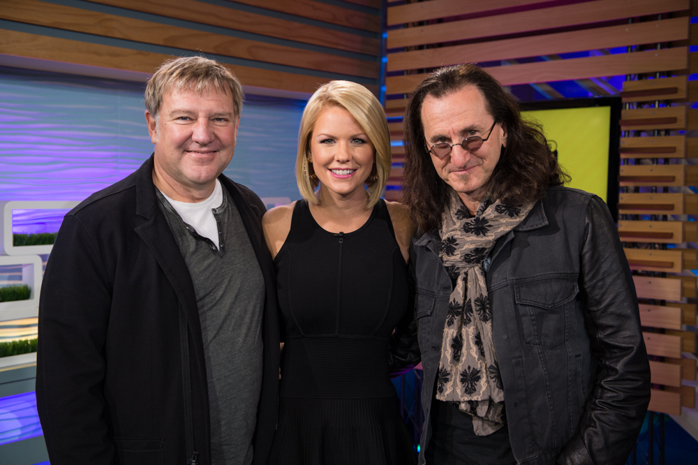 Carrie Keagan with Geddy Lee and Alex Lifeson from RUSH on the set of VH1's Big Morning Buzz Live with Carrie Keagan