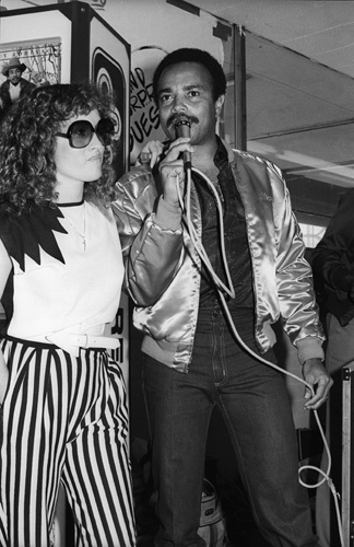 Teena Marie and Alonzo Miller of KACE radio station in Los Angeles at a Freeway Records store sales promotion