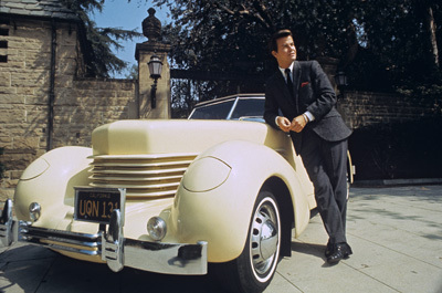 Dick Clark and his 1938 Cord 810 automobile circa 1970