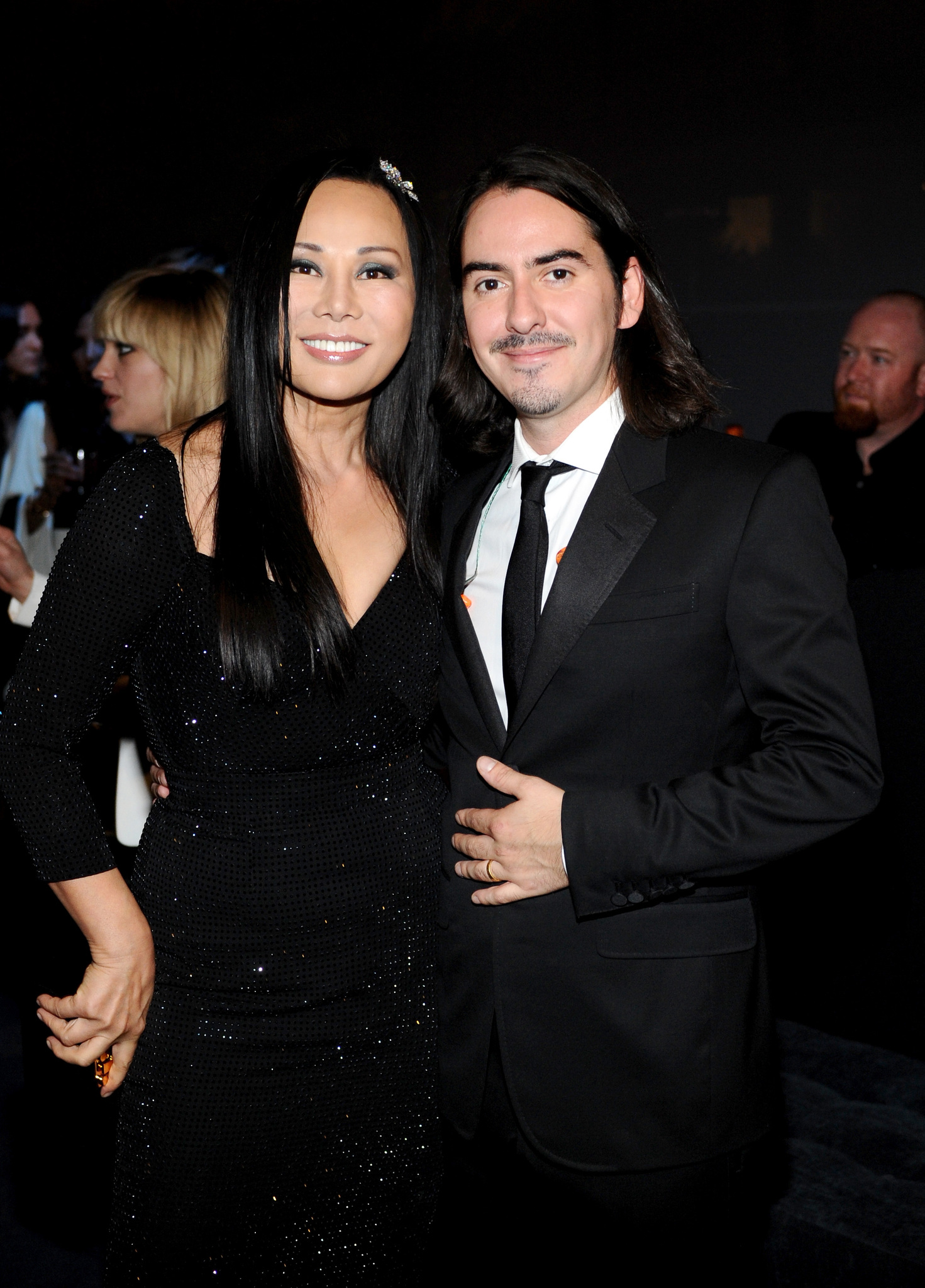 LACMA Trustee and Co-Chair Eva Chow (L) and musician Dhani Harrison attend the LACMA 2013 Art + Film Gala honoring Martin Scorsese and David Hockney