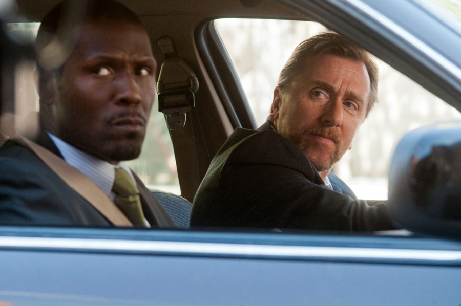 Still of Curtiss Cook and Tim Roth in Arbitrage