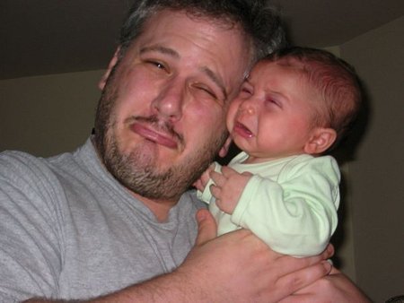 Greg with his son, Cooper. April 2005.