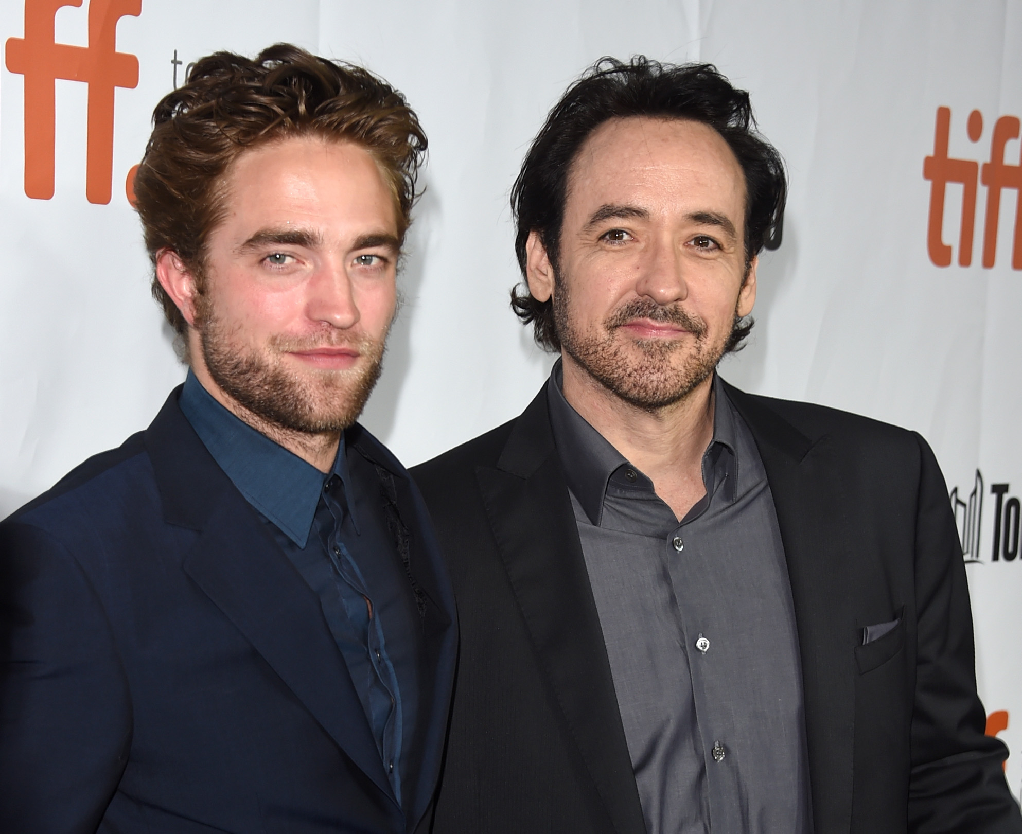 John Cusack and Robert Pattinson at event of Maps to the Stars (2014)