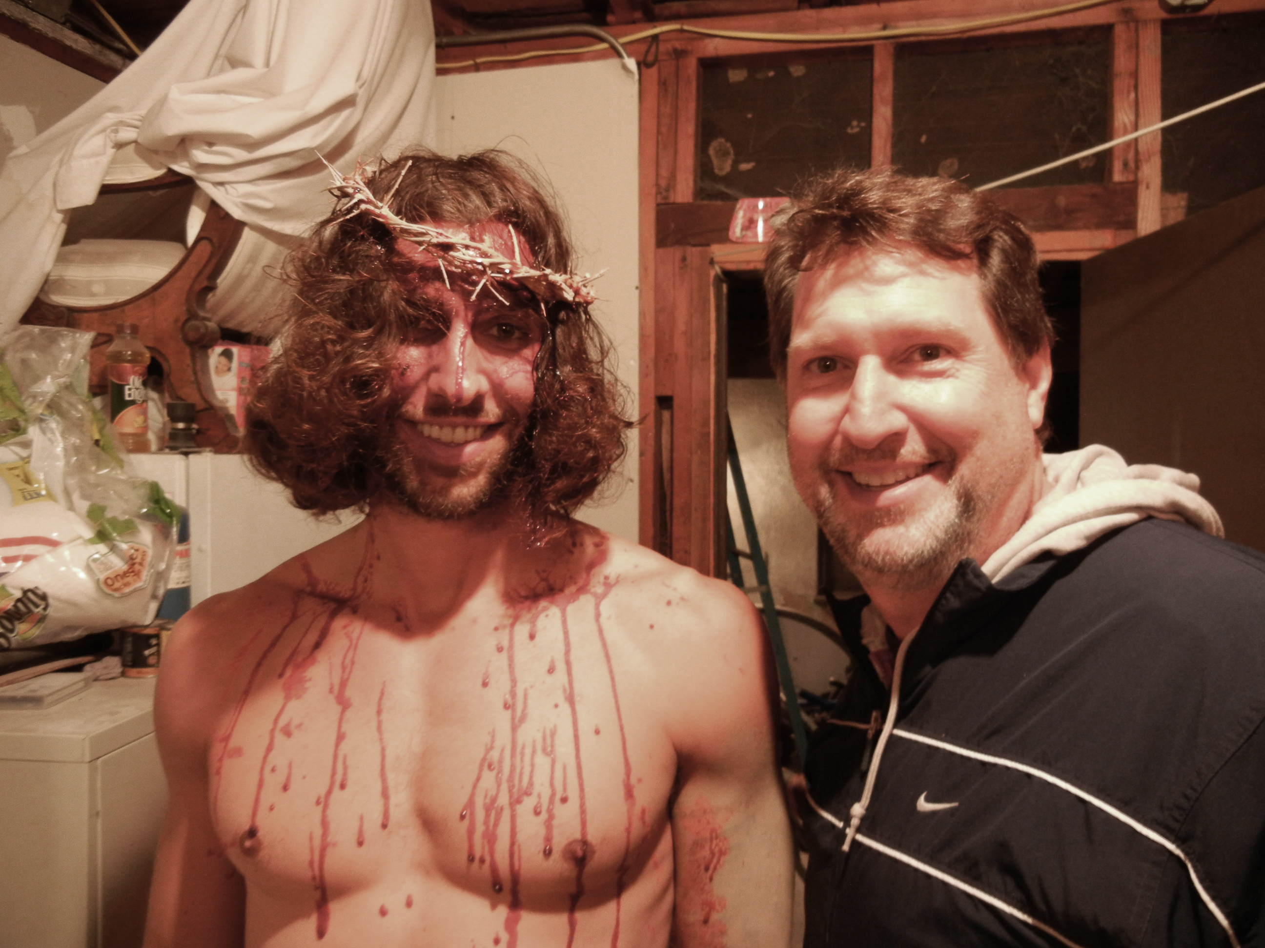 Brian Reed Garvin Checks out the blood effects on Actor Andrew Skully who plays Jesus in the Feature film, 