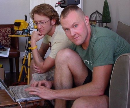 Vidkid Timo (left) watching as Jeffery Roberson (right) edits footage they filmed for a Varla Jean Merman musical video.