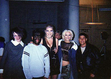 Chuy, and models, on the set of Turbo Negro's video 