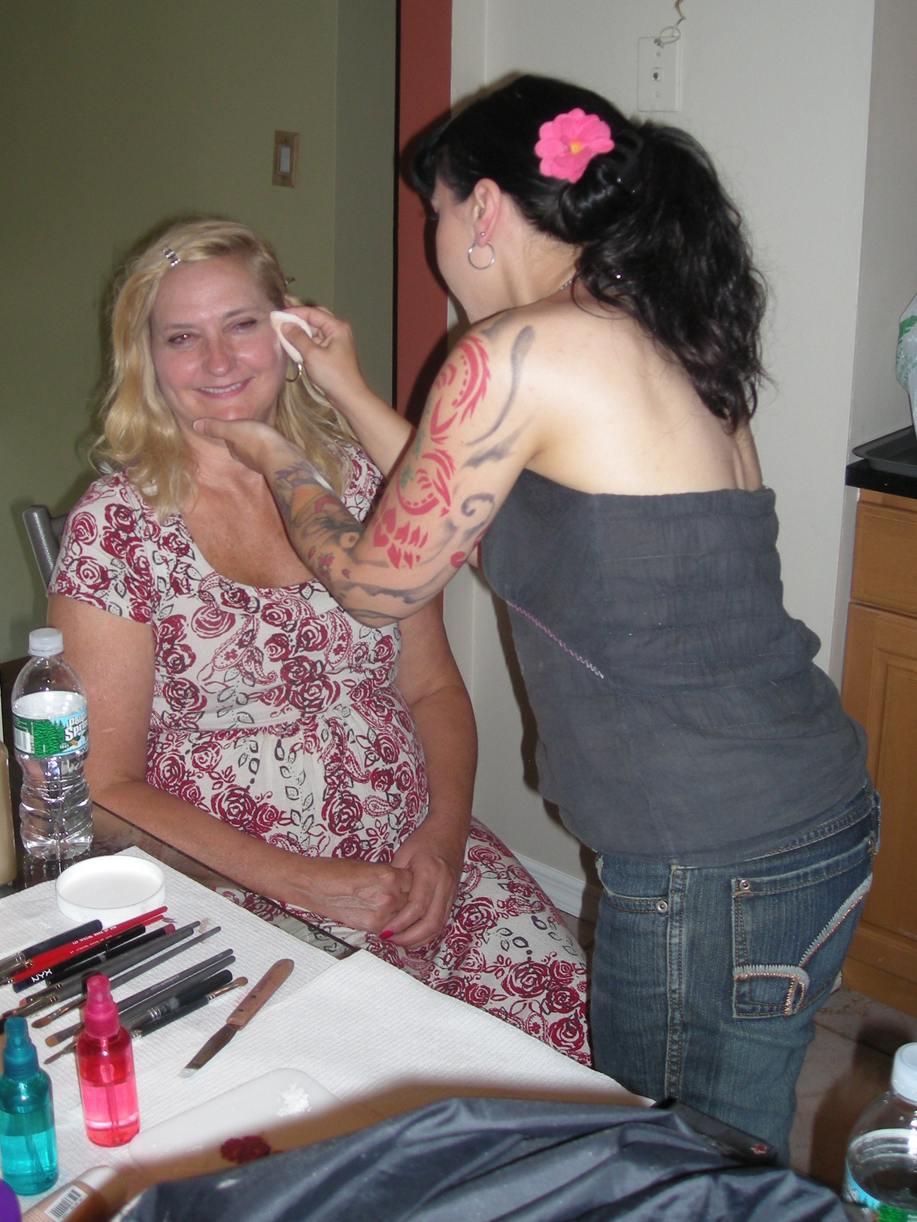 Helen Proimos (Mary) having her makeup applied on the set of 