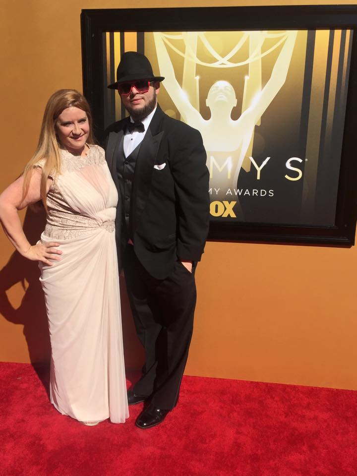 Producer Peggy Lane and Writer Chris Molina arrive at the 2015 Emmys.