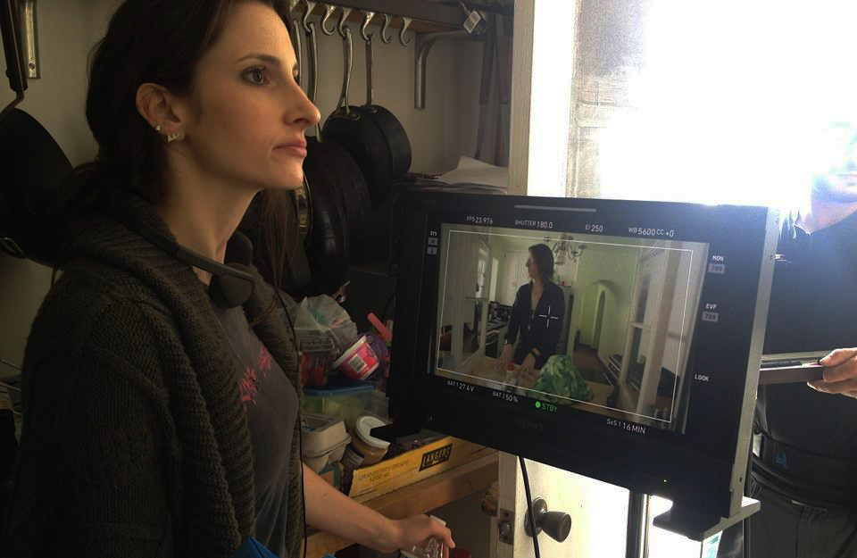 Candice Carella directing a scene for PONY.