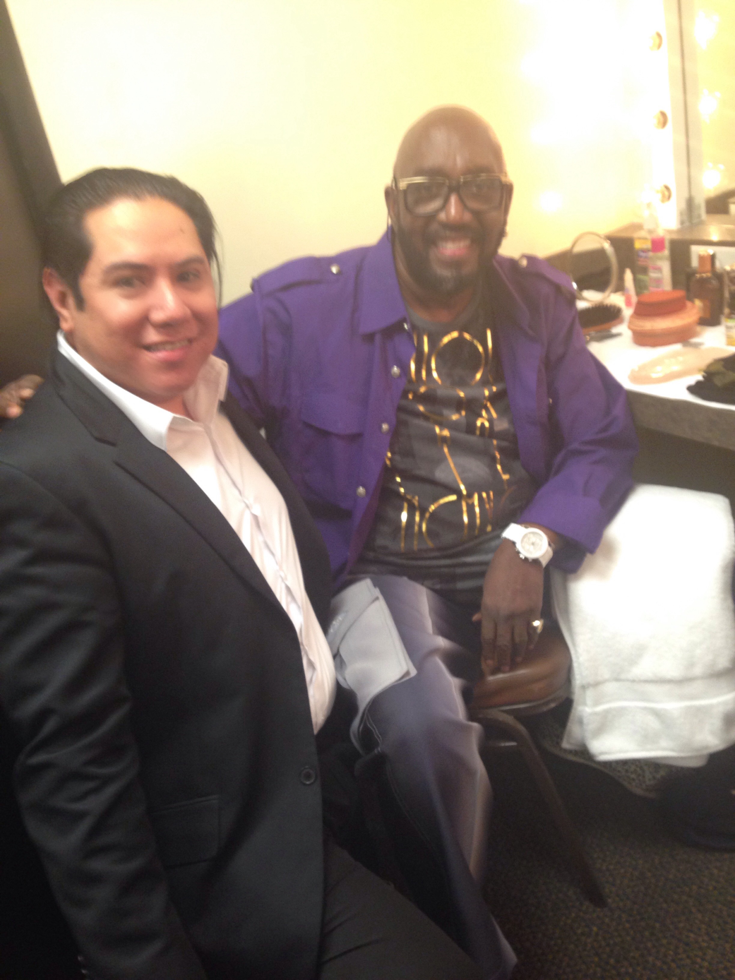 Otis Williams last original surviving member of the Motown vocal group The Temptations and Xavier Ramirez before a show.
