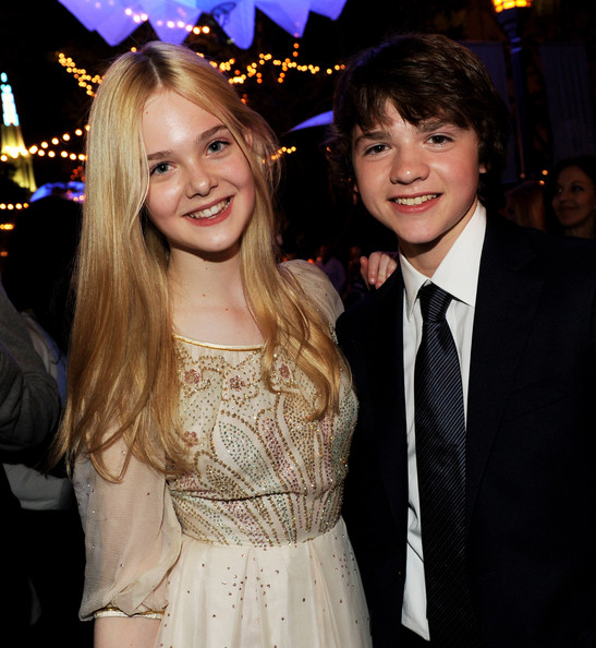 Elle Fanning and Joel Courtney pose at the after party for the premiere of Paramount Pictures' 