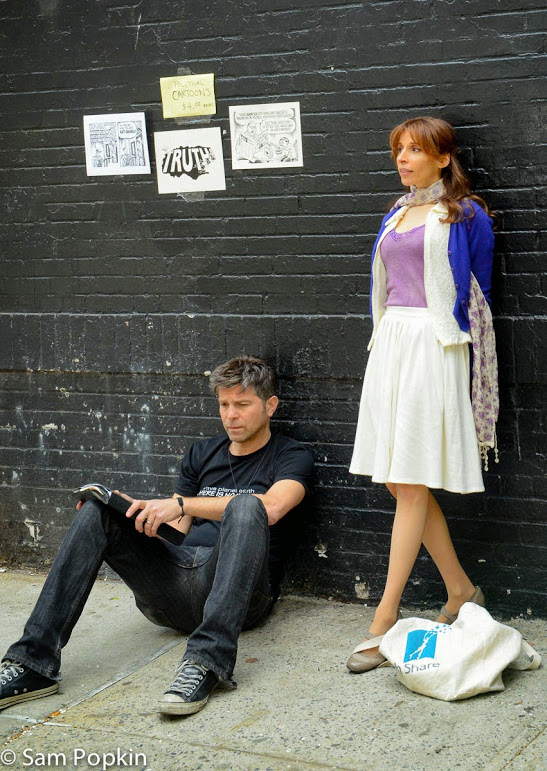 Alex Emanuel and Jillie Simon, preparing for a take, on set of 