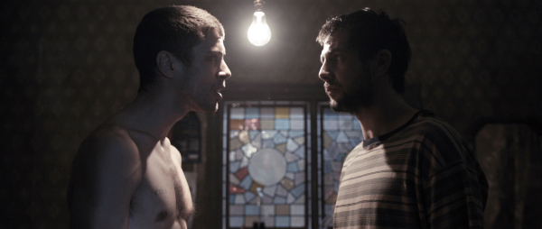 Still of Andy Linden and Toby Kebbell in RocknRolla (2008)