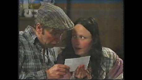 Still of Gwenfair Vaughan as series regular Megan in the first season of the Hafod Haidd/Barley Farm comedy series, with Dyfan Roberts.