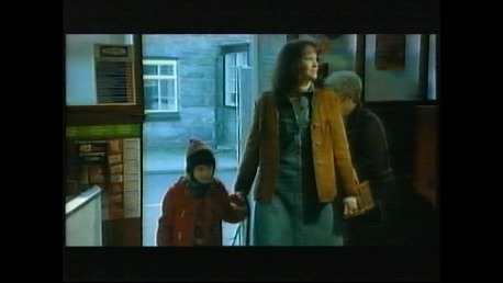 Still of Gwenfair Vaughan in Y Siop/The Shop television drama.