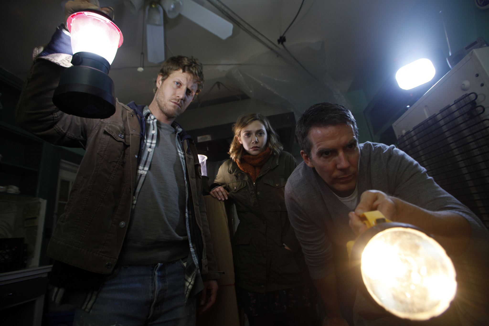 Still of Chris Kentis, Elizabeth Olsen, Adam Trese and Will Hart in Silent House (2011)