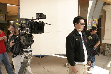 Lance (1st A.D.) gets ready to shoot while Maximo Munzi (D.P.) finishes setting the camera on the location-set of MYSTERY WOMAN: VISION OF A MURDER in Simi Valley, CA.