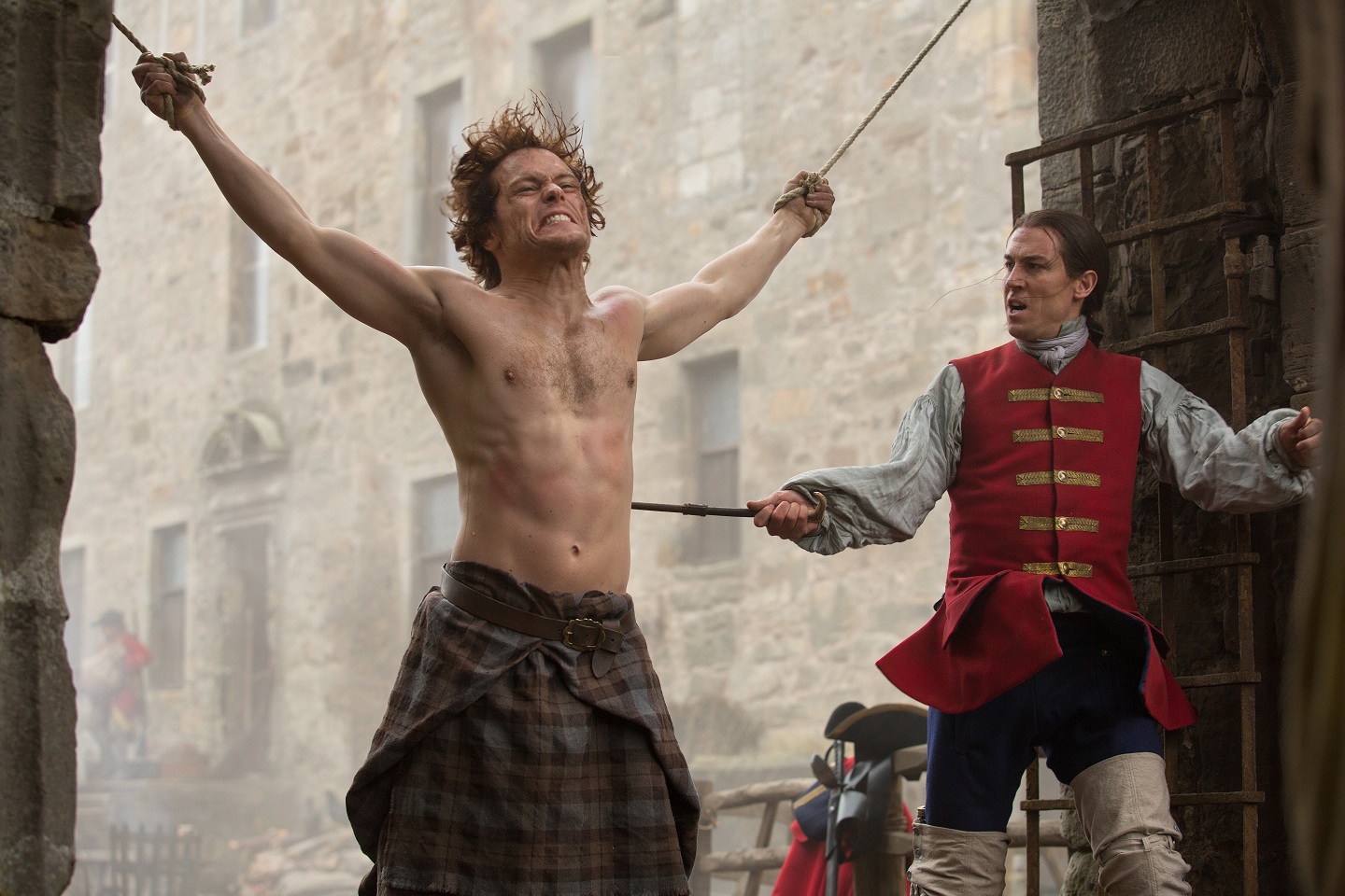 Still of Tobias Menzies and Sam Heughan in Outlander (2014)