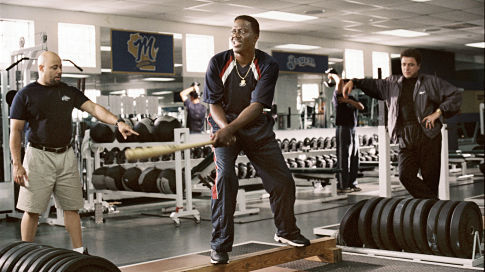 Stan Ross (Bernie Mac, center) swings back into action with the support of his team conditioning coach (Scott Brooks, left) and best buddy, Boca (Michael Rispoli, right).