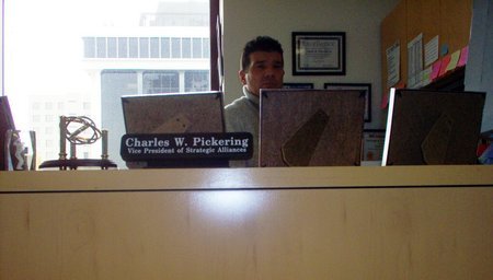 On 15 NOV 2005, hard at work for the 'cutting edge' communications and technology company 