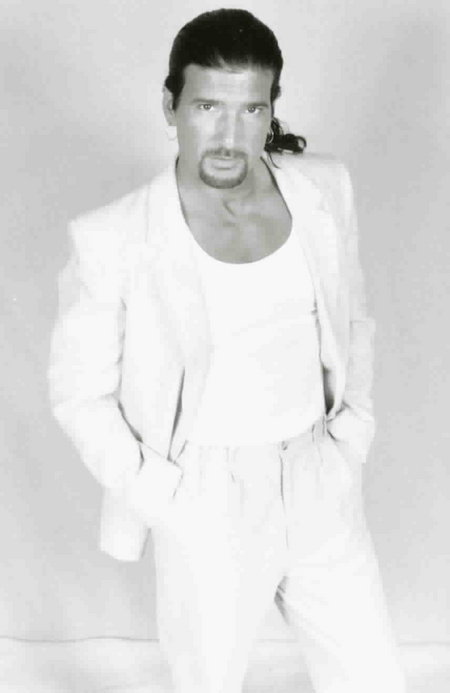 Carlo Corazon in the early 1990's. From his modeling portfolio (suit by Armani).