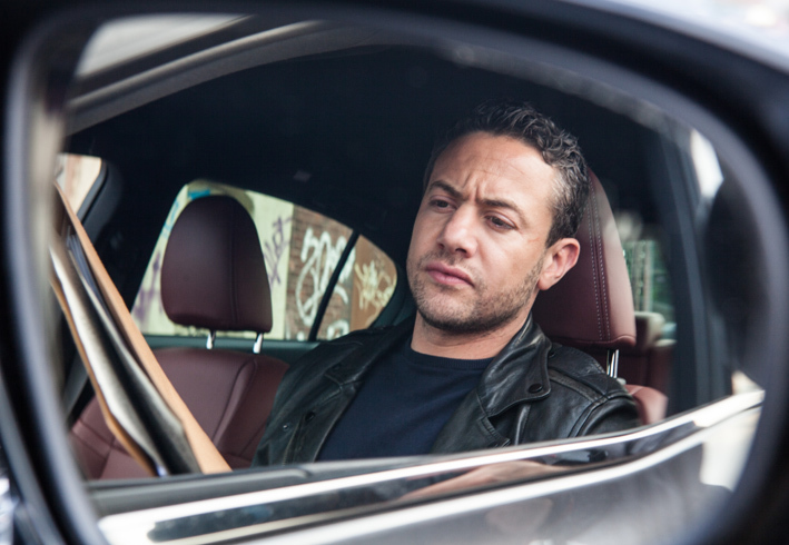 Still of Warren Brown in By Any Means (2013)