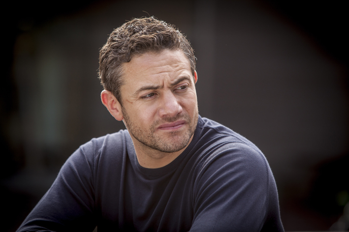 Still of Warren Brown in By Any Means (2013)