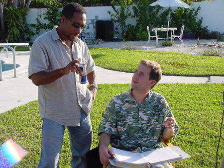 Director Jeff Yanik and actor Owen Miller discuss a scene on location in Miami, Florida.