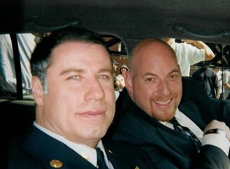 Andrew Aninsman and John Travolta on the set of Ladder 49 Funeral Scene.