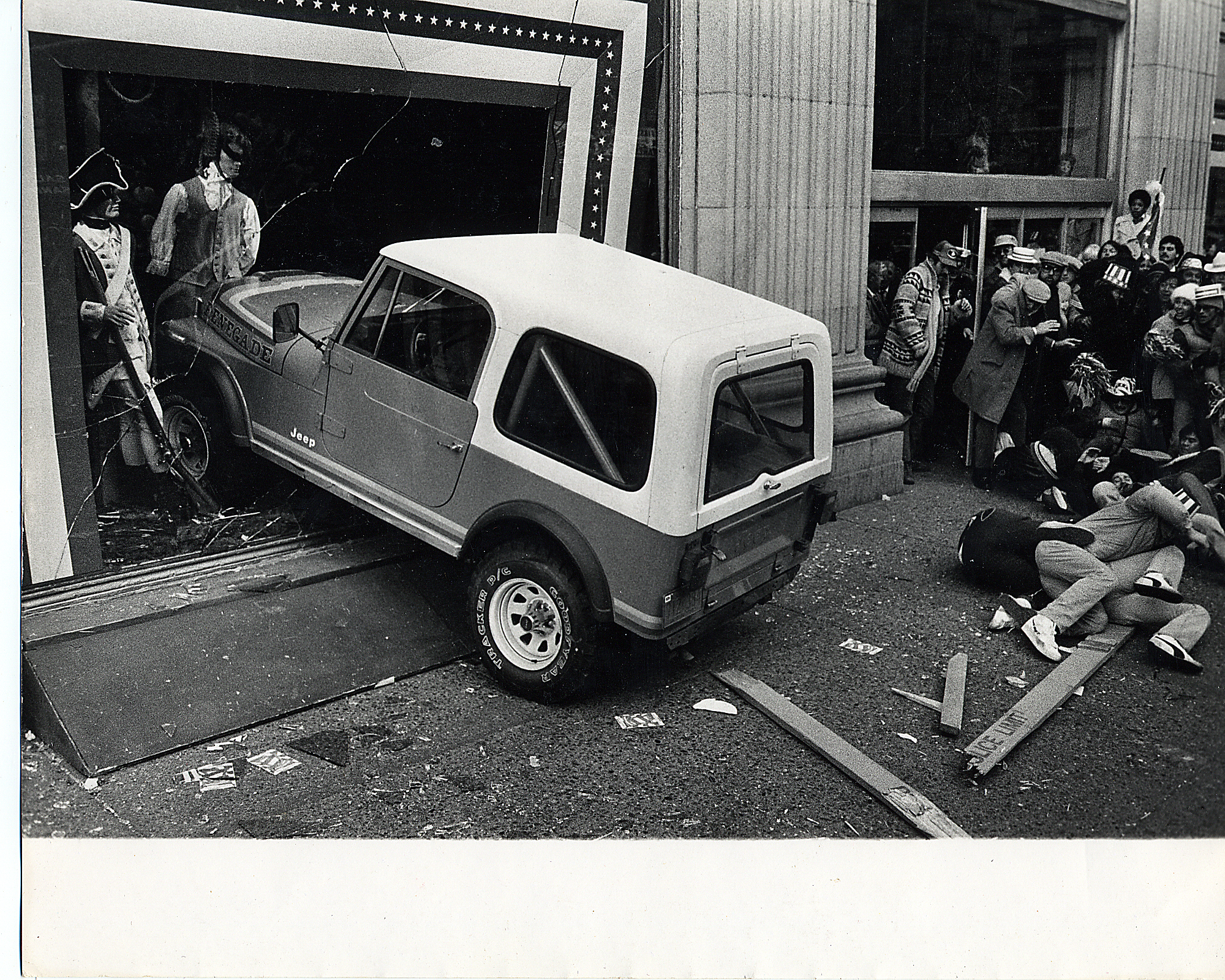 Stuntman Rudy C. Jones (middle right side on the ground facing camera)avoiding John Travolta crashing through Wanamaker's (Philadelphia)display window in the feature film 