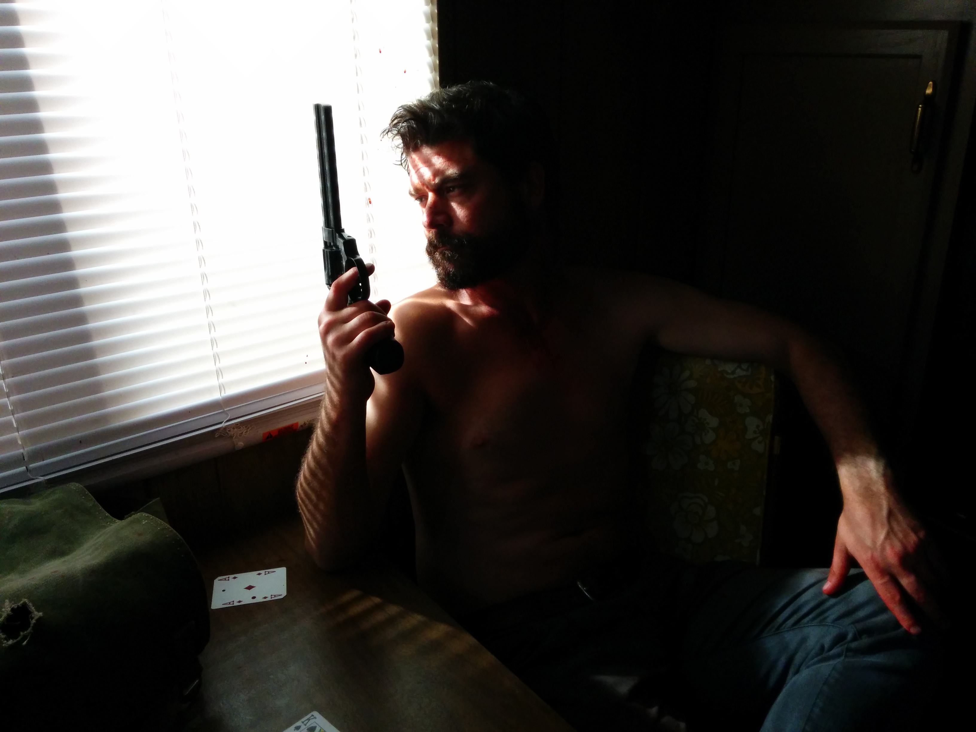John T. Woods as Bill Holden in 'Dead Bullet' (2015)