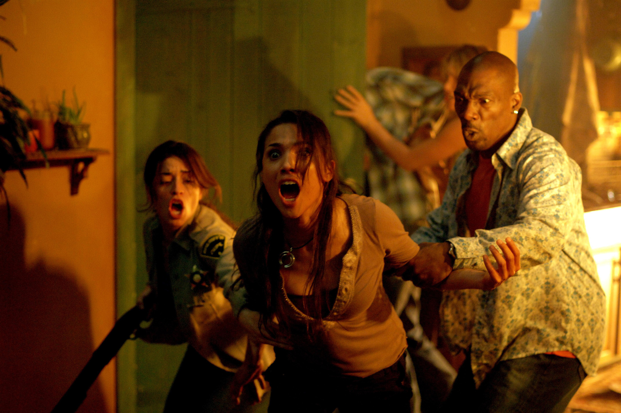 Still of Tonantzin Carmelo, Charlie Murphy and Emmanuelle Vaugier in Unearthed (2007)