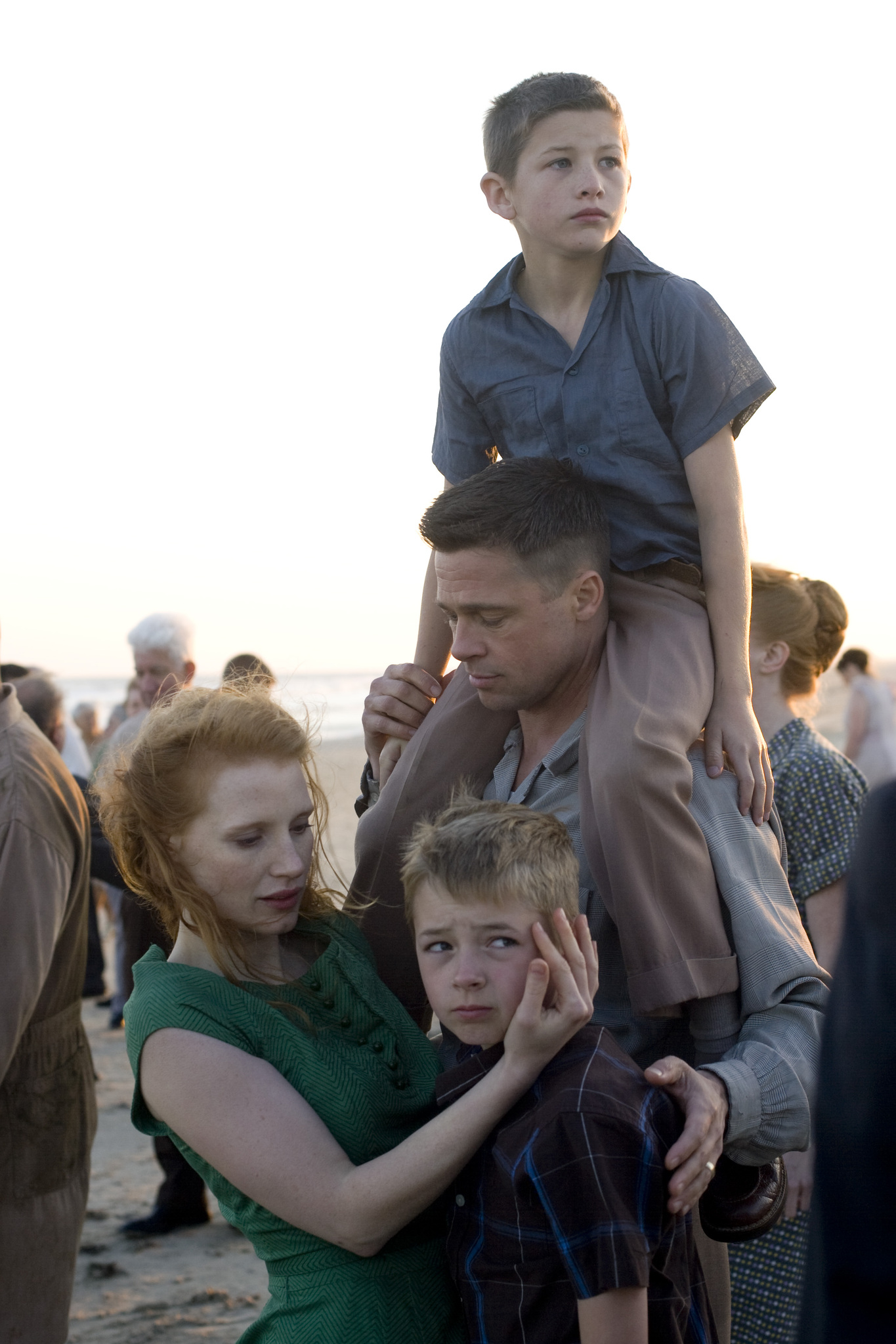 Still of Brad Pitt, Jessica Chastain, Tye Sheridan and Laramie Eppler in The Tree of Life (2011)