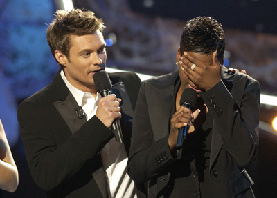 Ryan Seacrest and Fantasia Barrino at event of American Idol: The Search for a Superstar (2002)