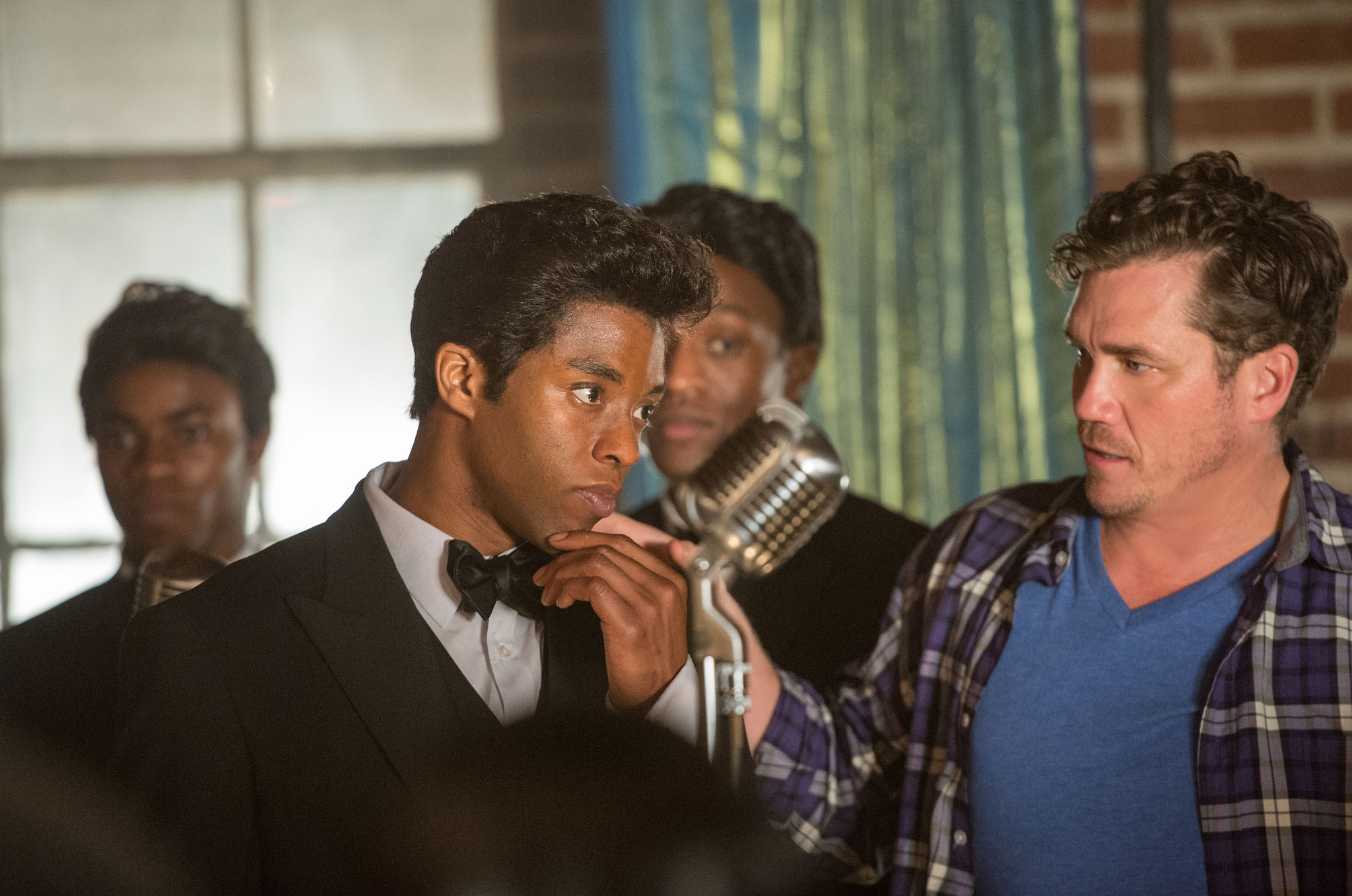 Still of Tate Taylor and Chadwick Boseman in Get on Up (2014)