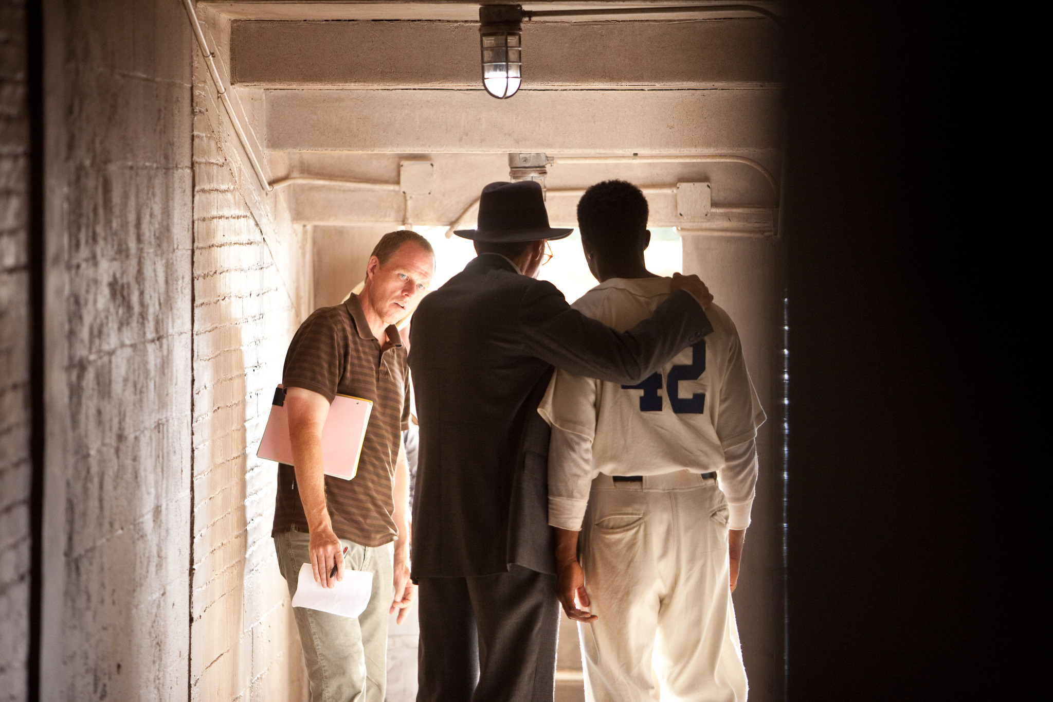 Still of Harrison Ford, Brian Helgeland and Chadwick Boseman in 42 (2013)