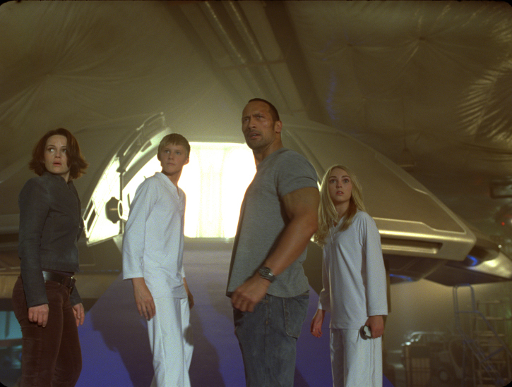 Still of Carla Gugino, Dwayne Johnson, AnnaSophia Robb and Alexander Ludwig in Race to Witch Mountain (2009)