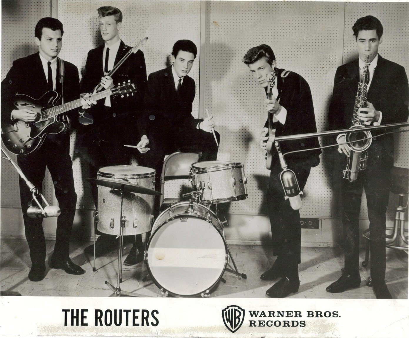 Randy Viers on drums, Michael Gordon, leader of The Routers, on guitar (far left).