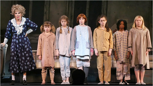 Kathie Lee Gifford, left, as Miss Hannigan, Madison Zavitz, 2nd orphan from left, as Pepper, and other orphans in a scene from ANNIE at the Theater at Madison Square Garden, NYC, during the 2006 holiday-season.
