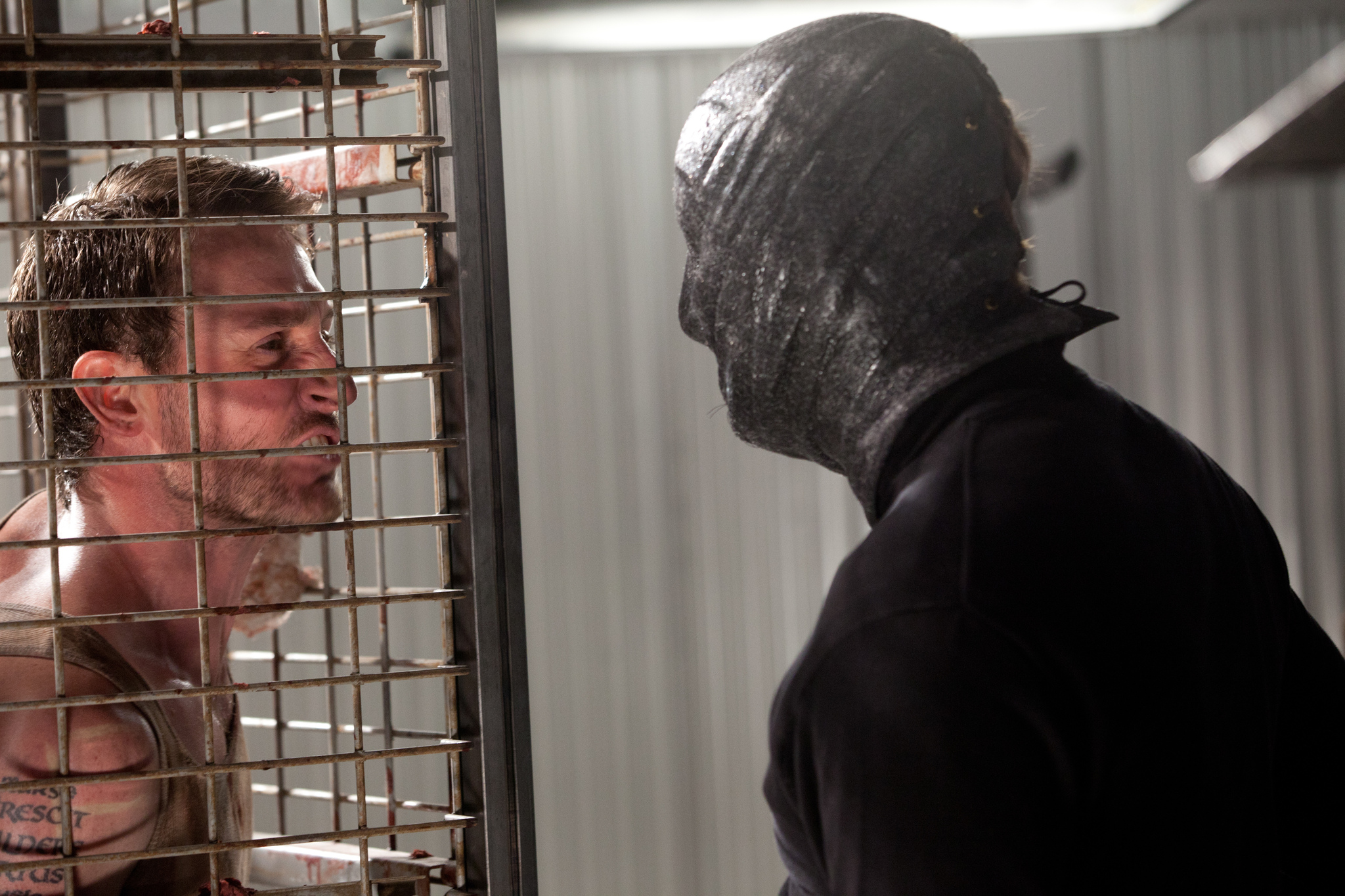 Still of Randall Archer and Josh Stewart in The Collection (2012)