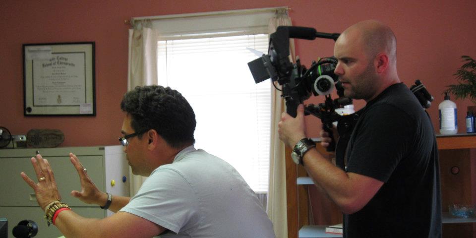 Kevin blocks out the shot with DP William Somerby on the set of back2one.