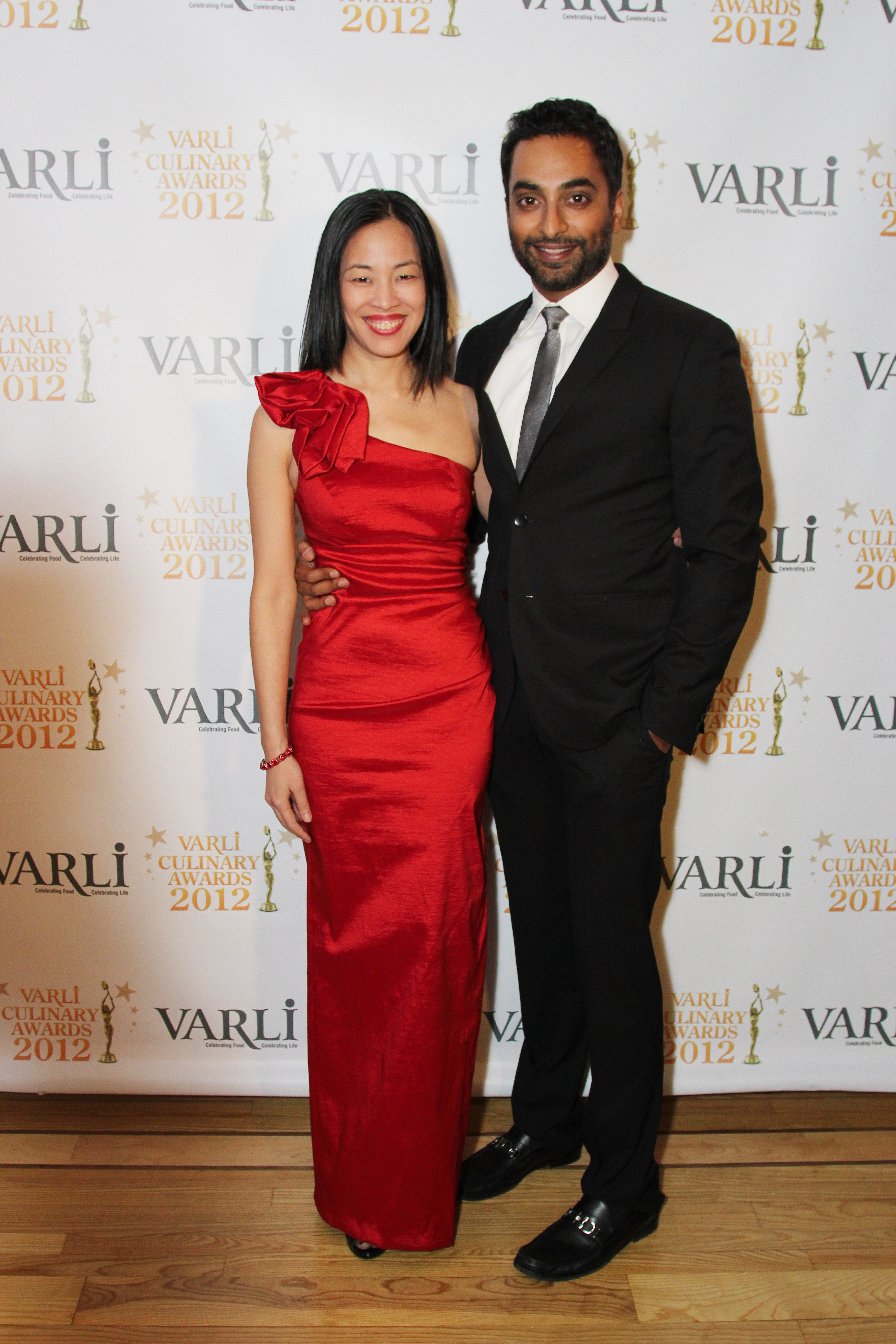 November 15, 2012: Actor Manu Narayan, co-host of the First Annual Varli Culinary Awards with actor/photographer Lia Chang, on the red carpet at The Altman Building in New York City.