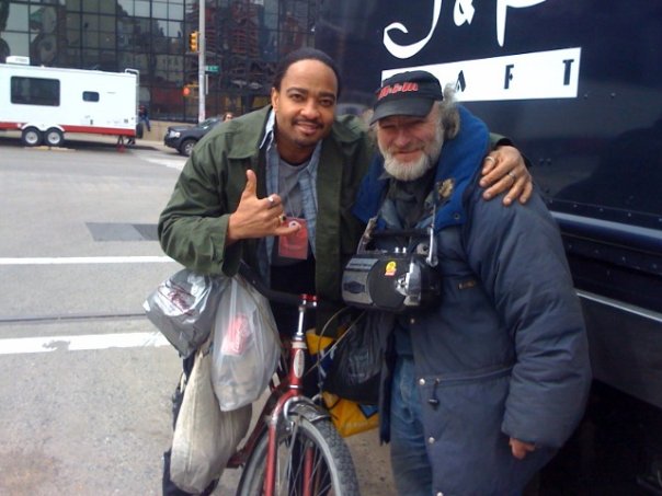 Actors, Dennis Jay Funny and Radioman (w/ his bicycle) outside Jacob Javitts Convention Center in Manhattan, NYC.
